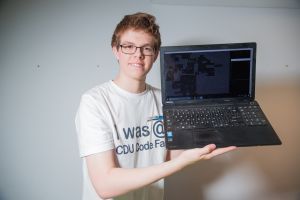 Student showing his game project